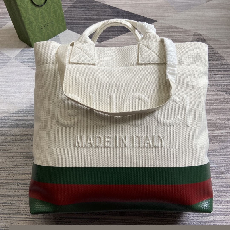 G*u*i shopping bags